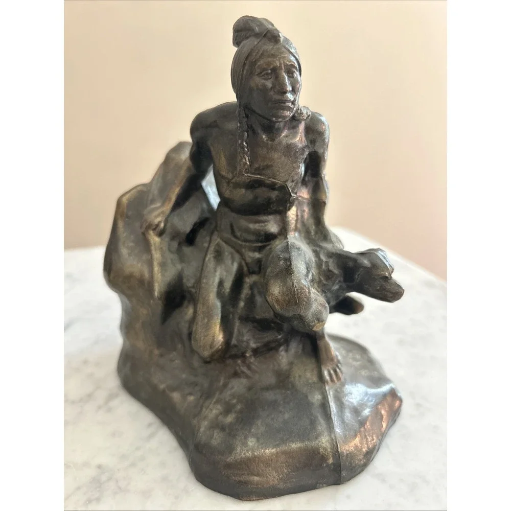 Antique Meal metal cast Indian bookends. Good condition.